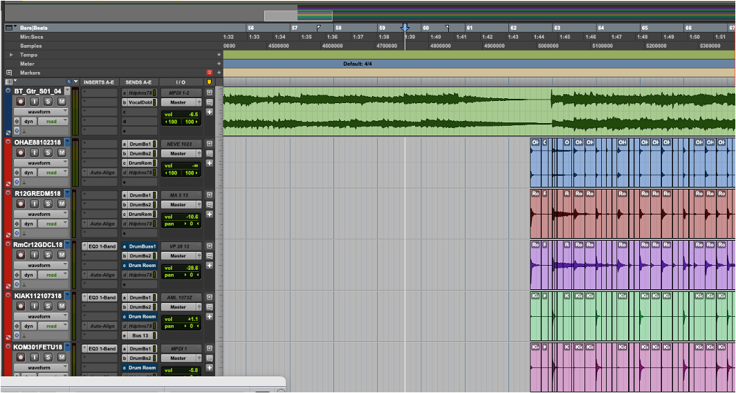A Pro Tools session with multiple stacked audio tracks across the timeline, the visual signature of comping and grid-aligned production.